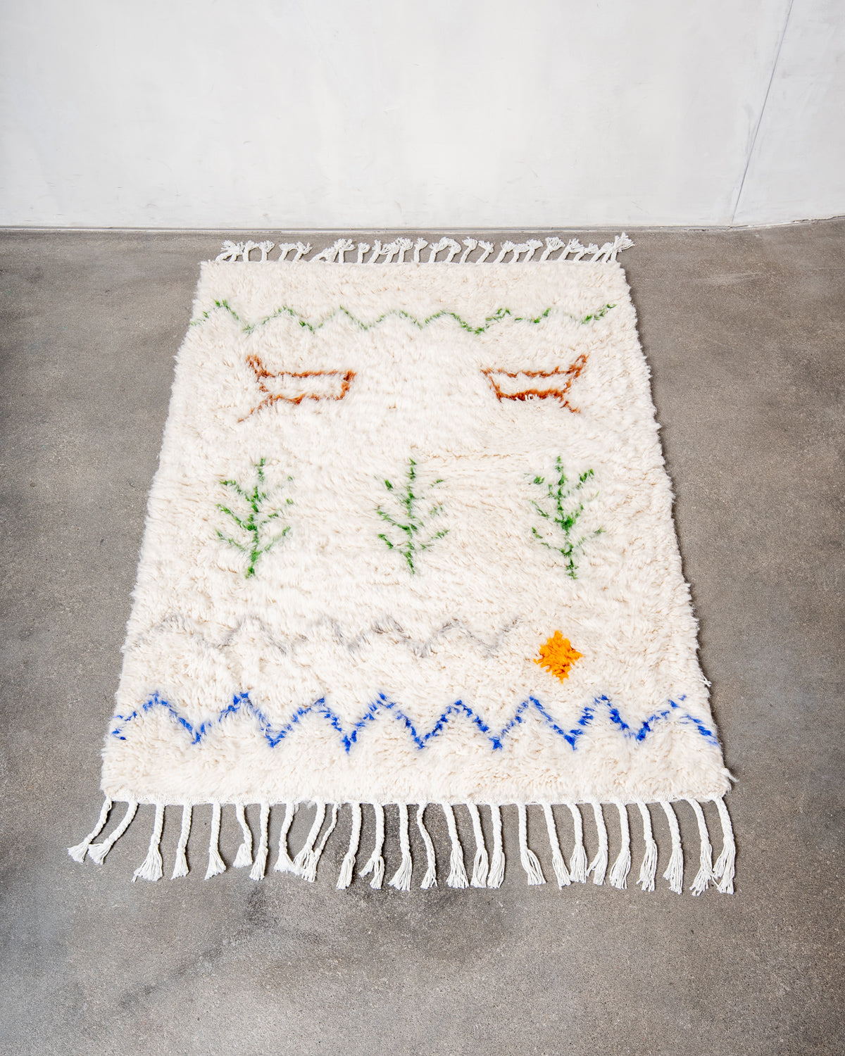 Modern, designer, handcrafted Berber rug from Morocco. Beniourain carpet with minimalist design, natural wool pile and a fluffy texture.